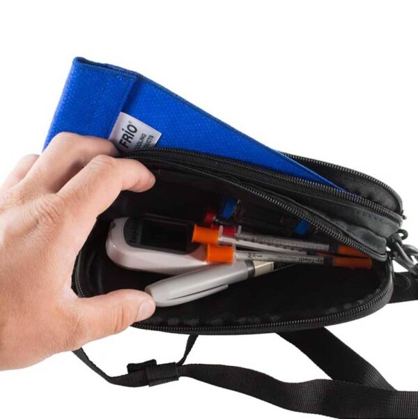 Red ChillMED Carry-All Diabetic Bag With Cold Pax inside the bag with Insulin Pen and Syringes