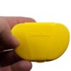 Yellow Vita Carry Pocket Clamshell Case Closed in Person's Hand