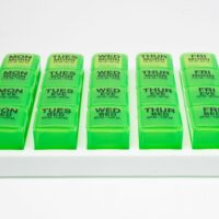 Four Times 7-Day Pill-Organizer green